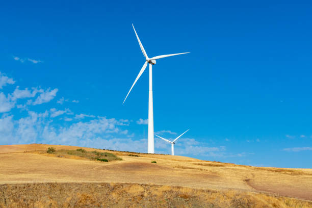 istock Modern wind mill and yellow fields in Andalusie, Spain 1218599680