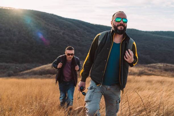 istock Two friends hiking in the hills 1218599892