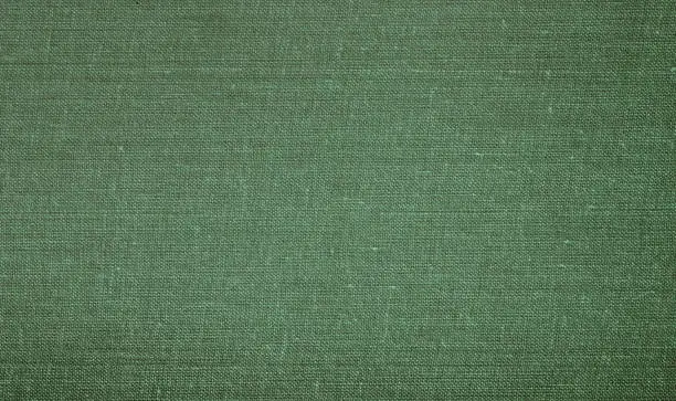 Photo of background fabric texture made from the cover of an old book