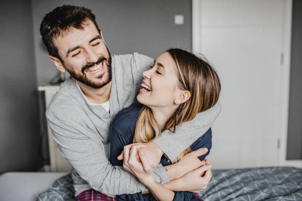 istock Young couple in bed 1218602992