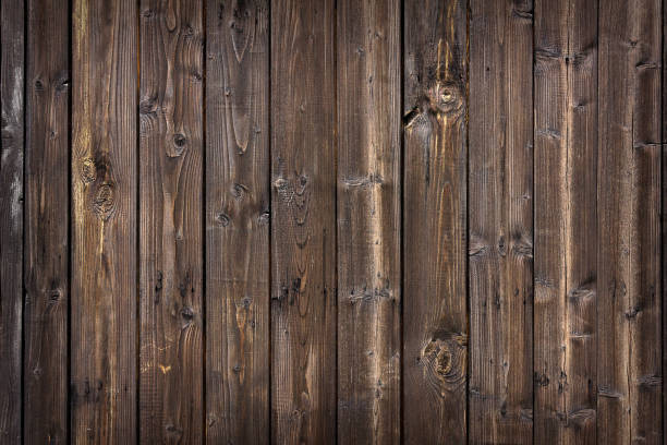 istock old wooden fence from boards close up 1218604163