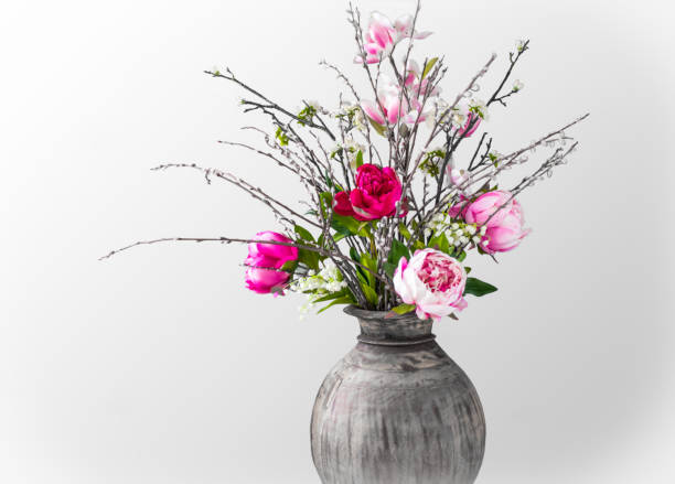 istock Wild modern spring bouquet with peony flowers in vase 1218604359