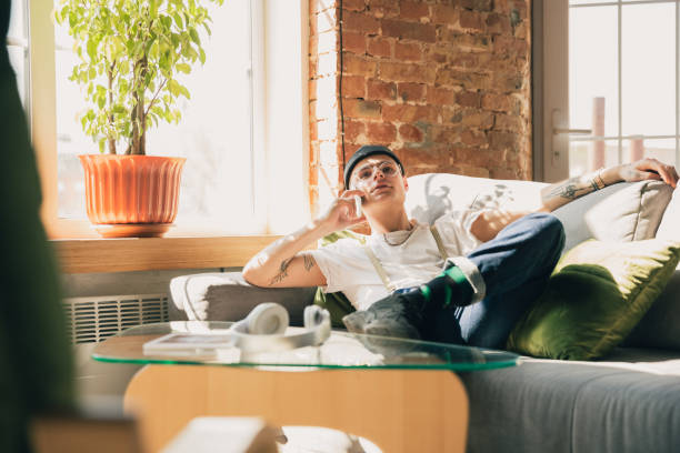 istock Young man studying at home during online courses or free information by hisself, online school 1218609492