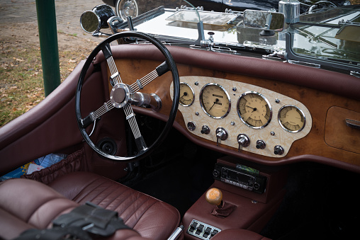 Usselo, Netherlands - October 21, 2018: vintage dashboard of an oldtimer car at an exhibition for classical cars