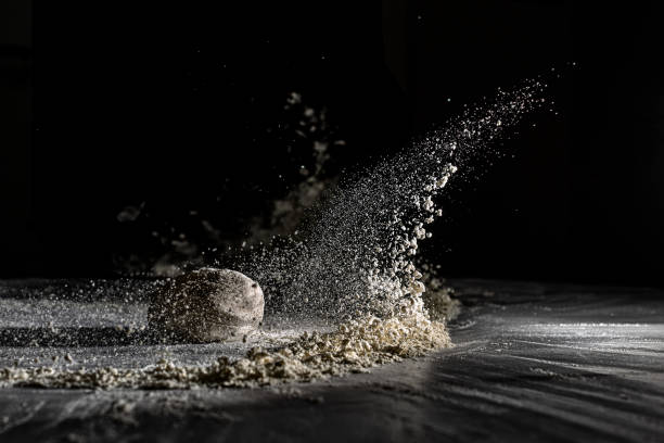 White powder of flour explosion White powder explosion on black background. Colored cloud. Colorful dust explode explosive photos stock pictures, royalty-free photos & images