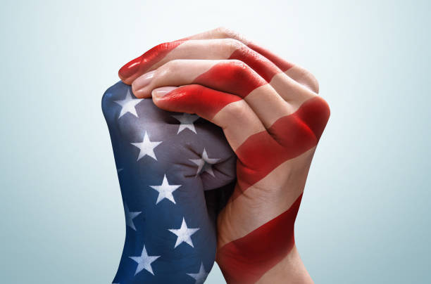 istock United Hands with American Flag Pattern 1218611622