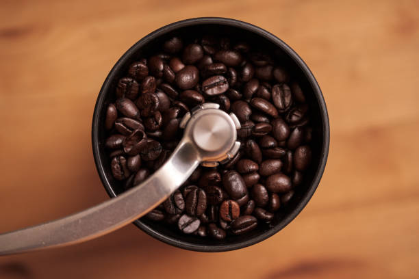 istock Top down view of a manual Coffee Grinder filled with whole coffee beans. 1218612201