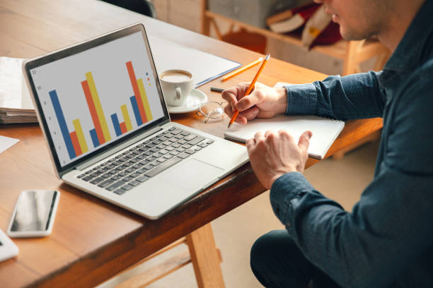 istock Creative workplace - organized work space as you like for inspiration, man working in office in relaxed posture 1218612320