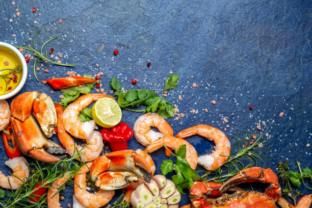 fresh dorado fish and vegetables on wooden board - food and drink fresh dorado fish and vegetables on wooden board - food and drink chilean wine stock pictures, royalty-free photos & images