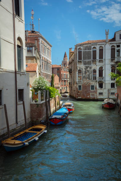 Canals and streets of Venice Historical center of Venice, picturesque canal, colorful and rustic street with beautiful old buildings. Venice one of the most famous travel destination in the world is a city in northeastern Italy and the capital of the Veneto region. venice italy grand canal honeymoon gondola stock pictures, royalty-free photos & images