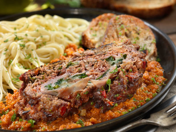 istock Sicilian Style Rolled Meatloaf with Deli Ham, Basil and Mozzarella 1218614121