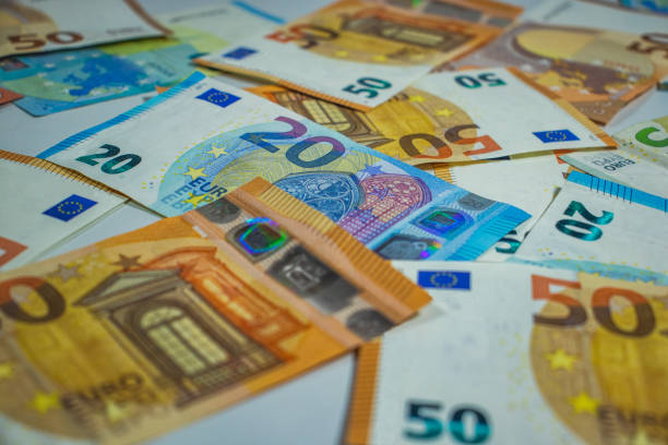 euro money, euro cash background, money banknotes - euro symbol european union currency coin european union coin photos et images de collection