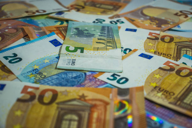 euro money, euro cash background, money banknotes - euro symbol european union currency coin european union coin photos et images de collection