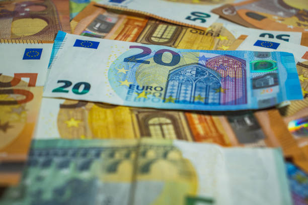 euro money, euro cash background, money banknotes - euro symbol european union currency coin european union coin photos et images de collection