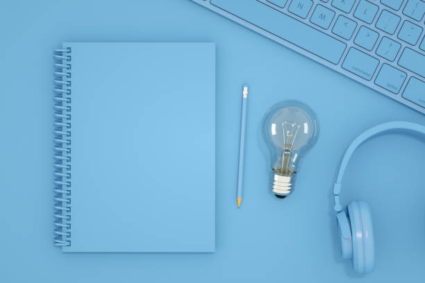 istock Top view of empty notebook with light bulb, new idea, brainstorming concept. 1218615441