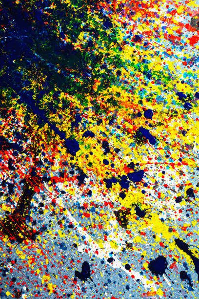 istock Bright background graphic image. dripping. expression. multicolored. black white red yellow blue. On the concrete texture. vertical orientation. top view. flat lay. 1218617756