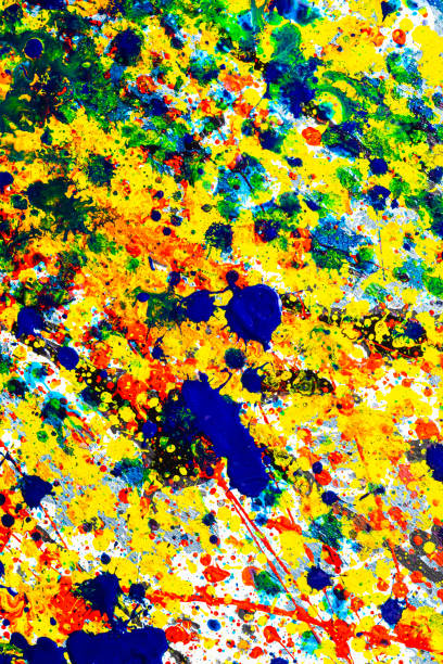 istock Bright background graphic image. dripping. expression. multicolored spill blemish. mixing colors. Phantom Blue black white red yellow. Vertical orientation. top view. 1218619834