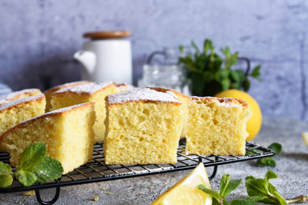 istock Lemon cake with zest on a concrete background. View from above. 1218620650