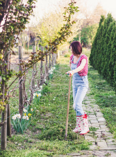 istock Woman in the garden 1218622266