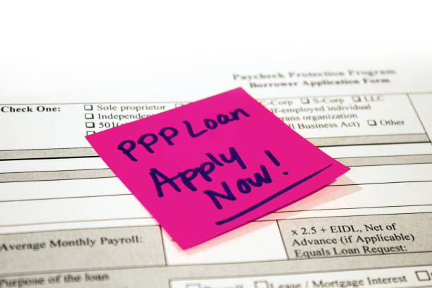 Paycheck Protection Program Application and Reminder Note stock photo