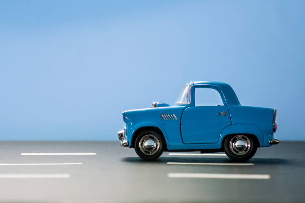 istock Blue toy car on a blue background. 1218630197