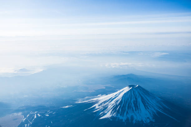 View of Mt. Fuji from the airplane window.Aerial photography of Japan.