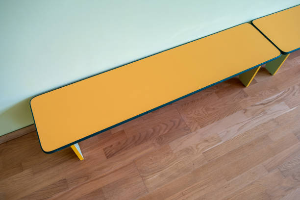 istock Yellow benches inside a school sports gym. 1218631694