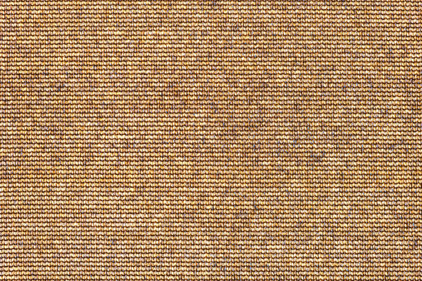 Abstract brown texture background. Surface of rough sack cloth canvas as backdrop for design.