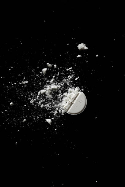 Crumbled White Circle Pill On Black Background Drugs Isolated Black Copy  Space Healthcare Medicine Concept Aspirin Antibiotics Stock Photo -  Download Image Now - iStock