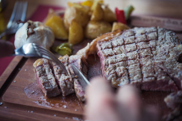 istock Roasted beef on wooden plate 1218635186
