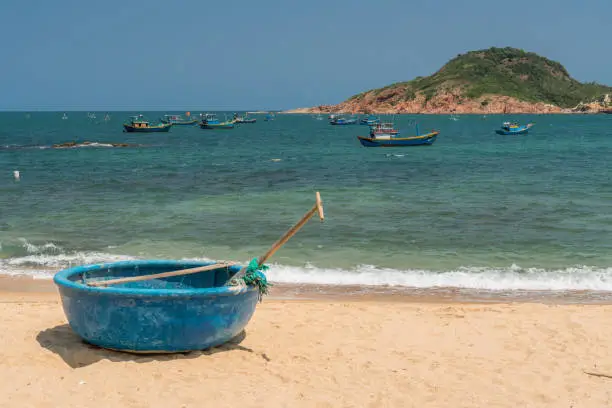 Coracle and fishing boats, Bãi Rạng Beach, Quy Nhon, Vietnam