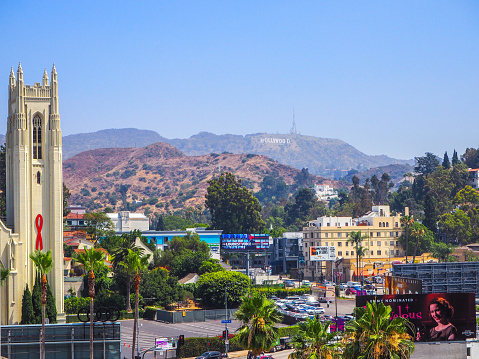 On July 20th 2019, tourists were enjoying a view on Hollywood sign from Hollywood Boulevard shopping mall in Los Angeles