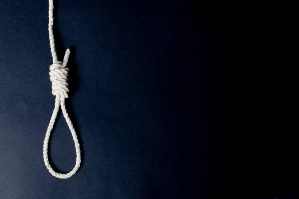 istock White rope gallows on black background 1218639812