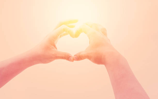 istock Muscle man making heart sign. Vintage tone. 1218640456