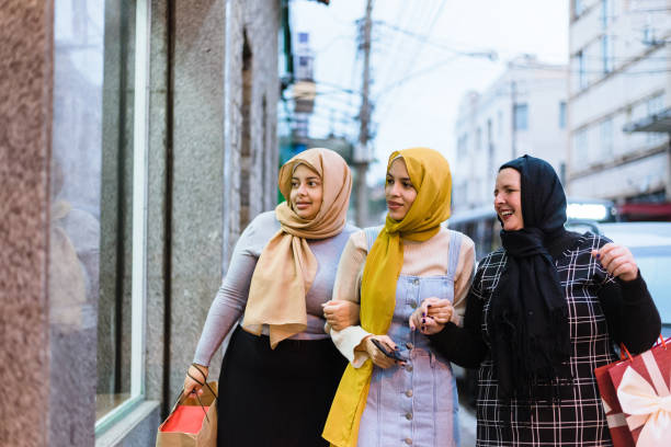 istock Muslim women looking at store windows 1218640814