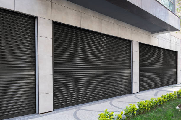 Closed Shops black metal roller shutter door.