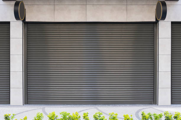istock Closed Shop With Metal Roller Shutter Door. 1218646565