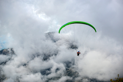 Paragliding in cloudy weather.