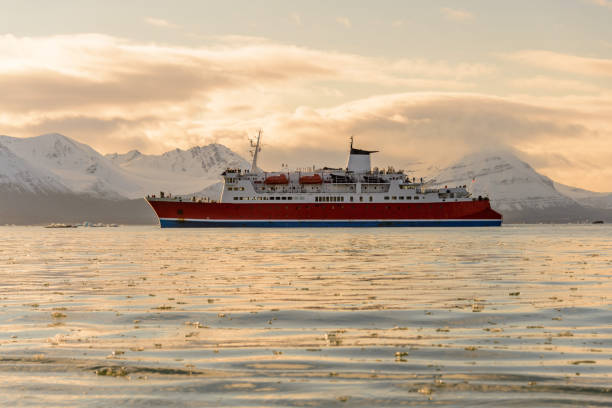 Expedition ship in Arctic sea, Svalbard. Passenger cruise vessel. Arctic and Antarctic cruise. stock photo
