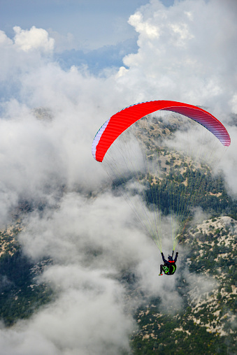 Paragliding in cloudy weather.