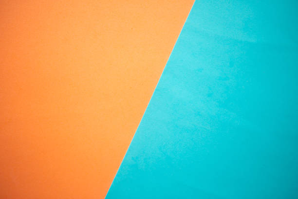 istock pink and blue geometric paper background texture 1218651504