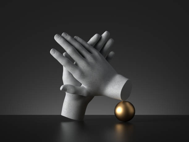 istock 3d render, mannequin hands applause gesture and golden ball isolated on black background. Concrete sculpture art object. Minimal fashion concept, simple clean design. Human limb prosthesis 1218652583