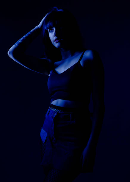 istock Portrait in blue of a beautiful lady 1218652944