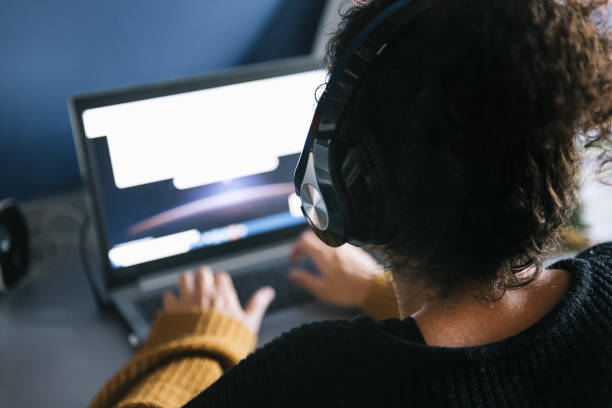 istock entrepreneur woman working on laptop at home 1218659582