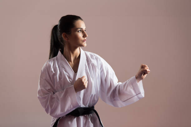 istock Woman In A Kimono With A Black Belt Meditates 1218659876
