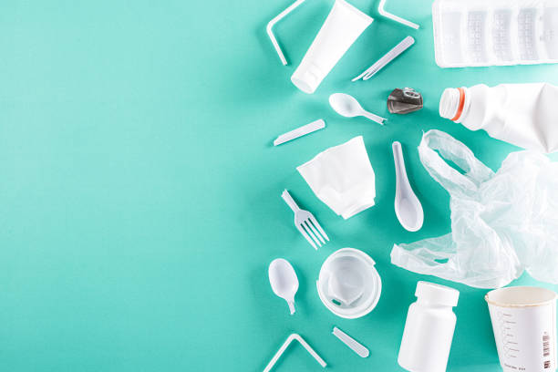 istock Top view of Different garbage materials on green pastel background. Recycle, World Environment Day, go green and Eco concept 1218661273