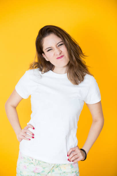 istock woman smiling infront a camera 1218661788