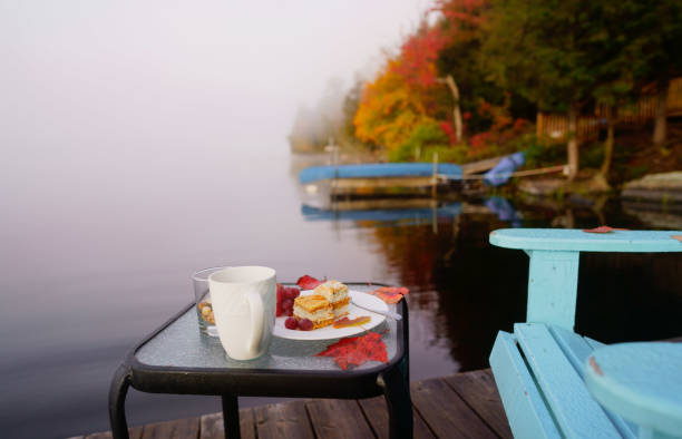 black tea cup in the deck . autumn