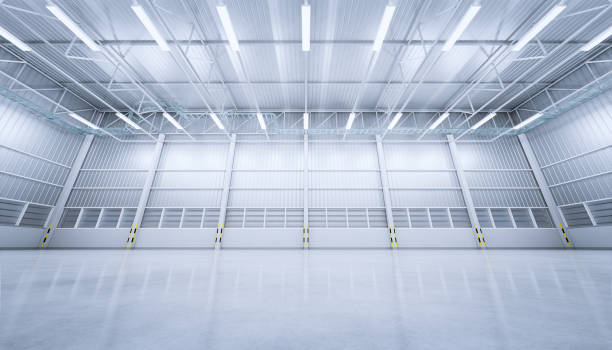 istock 3d rendering of empty warehouse building with concrete floor. 1218673350