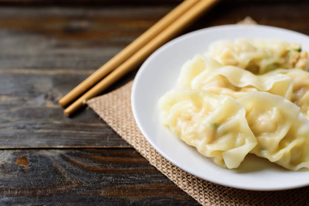 istock Steamed wonton dumpling stuffed with minced pork and shrimp 1218678349